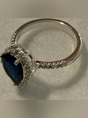 Silver Ring with Deep Blue Teardrop Stone and Pavé Accents
